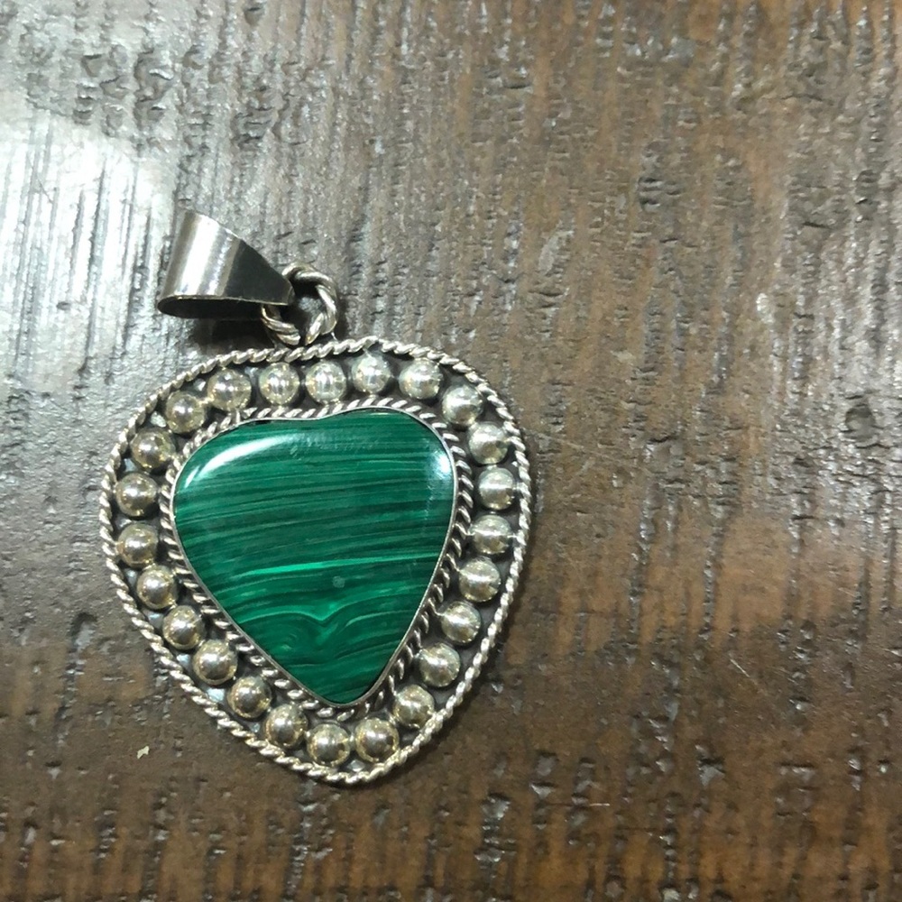 Sterling silver heart with green stone